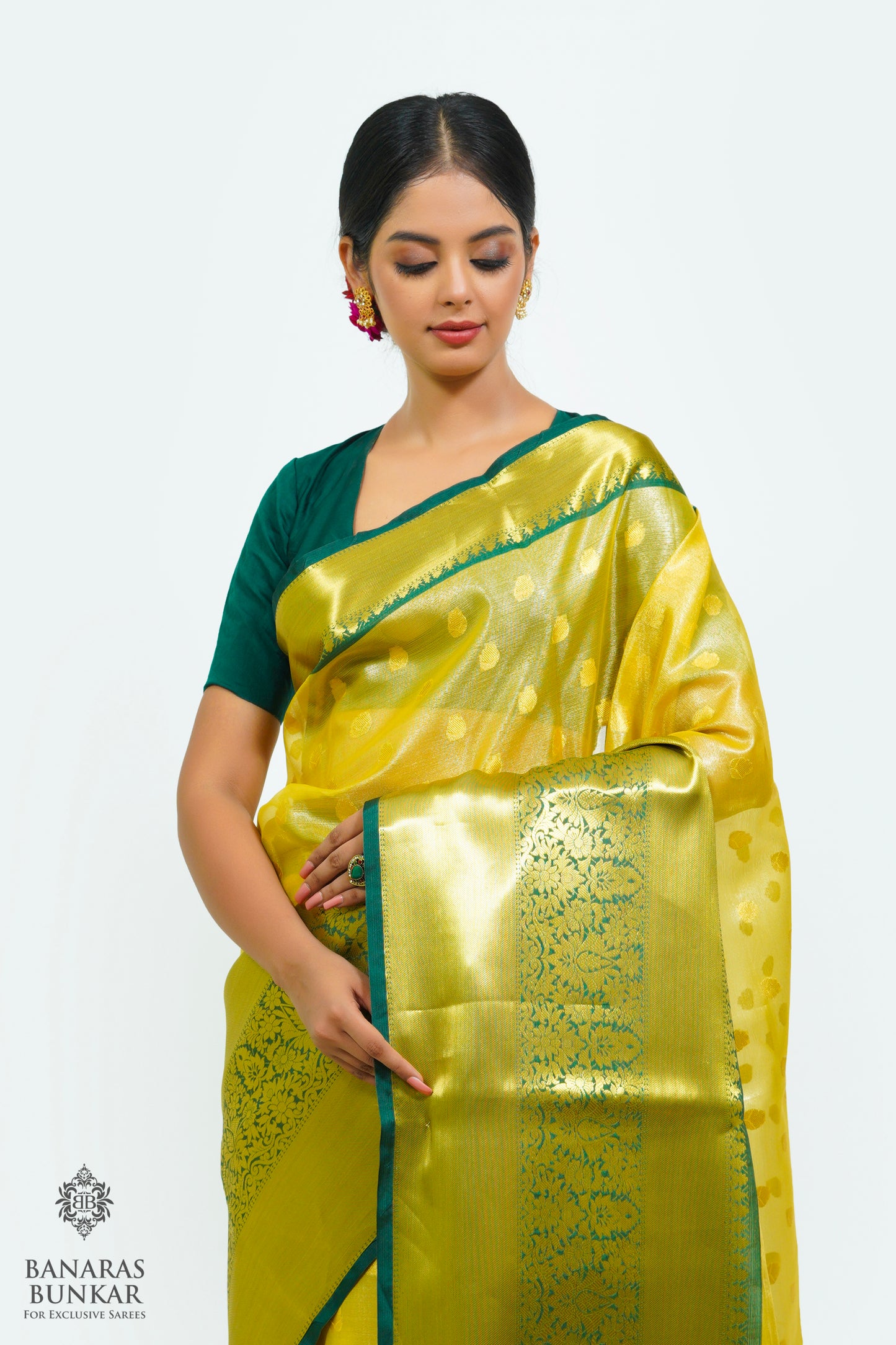 Banarasi Tissue silk saree allover Buti design with contrast skirt Border.