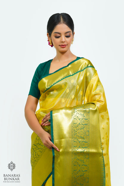 Banarasi Tissue silk saree allover Buti design with contrast skirt Border.