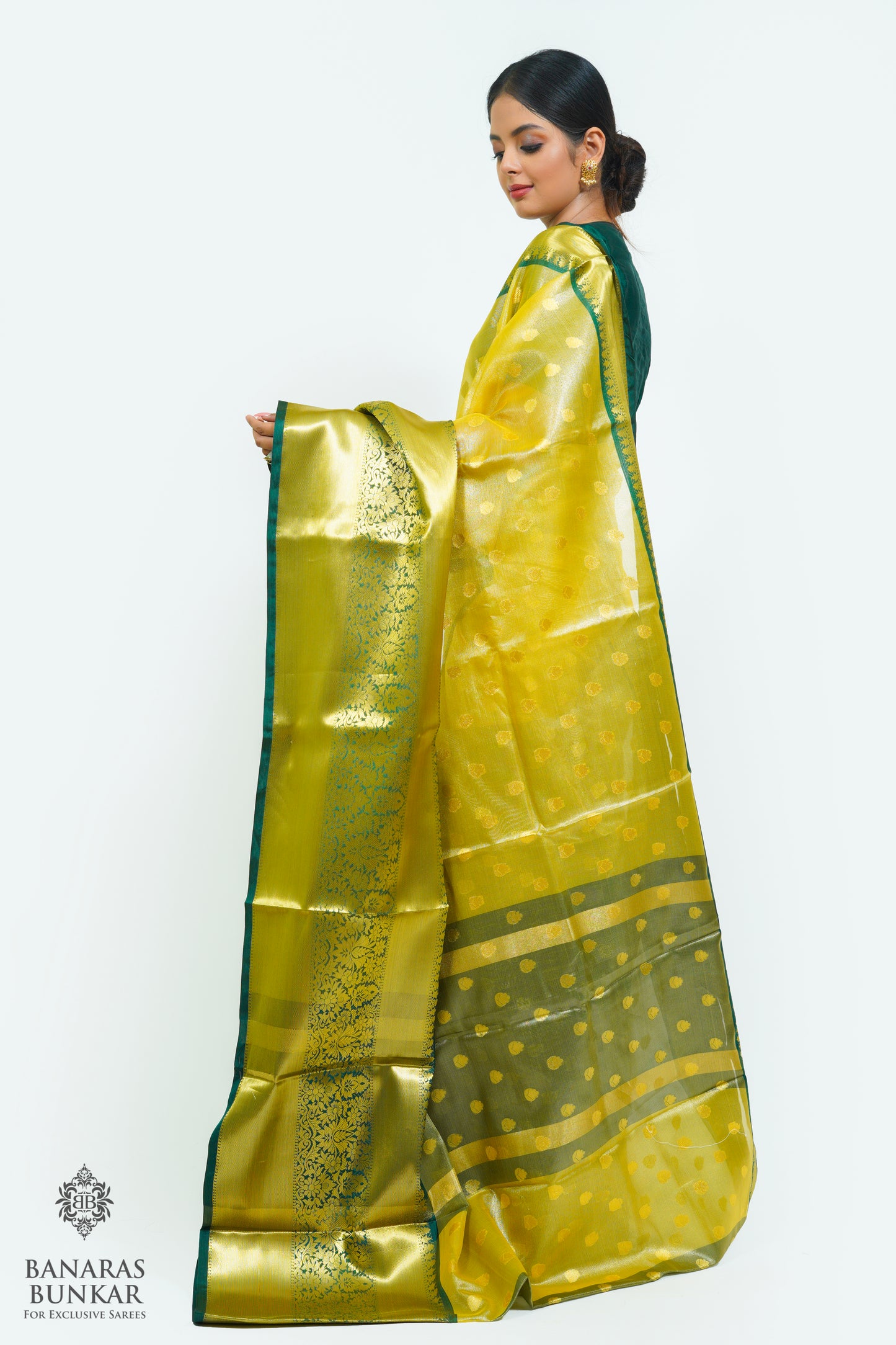 Banarasi Tissue silk saree allover Buti design with contrast skirt Border.