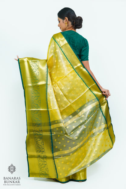 Banarasi Tissue silk saree allover Buti design with contrast skirt Border.