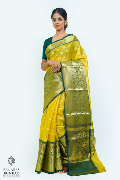 Banarasi Tissue silk saree allover Buti design with contrast skirt Border.