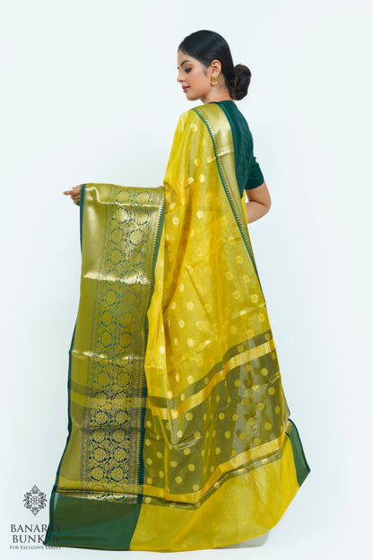 Banarasi Tissue silk saree allover Buti design with contrast skirt Border.
